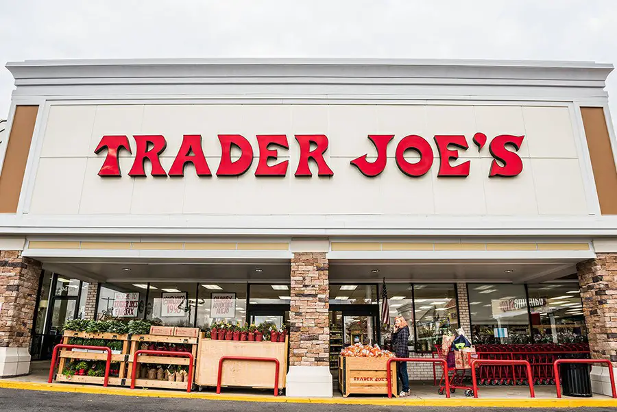 Trader Joes grocery store entrance with sign